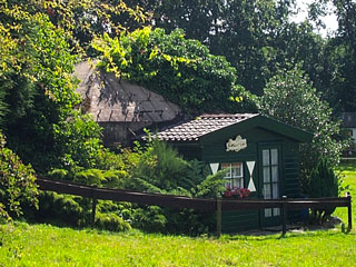Groepsschuilplaats als zomerhuisje bij Muiderberg.